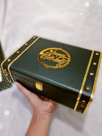 The box is part of the gift! I use these premium black and gold trunk boxes for a classic, reusable gift that feels luxurious from the moment they receive it.