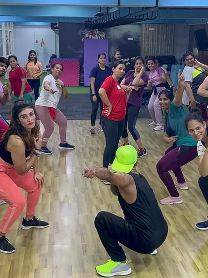 Strike a pose. A fun moment captured after a powerful dance fitness session. We work hard, but we always make time to laugh and celebrate our progress together.