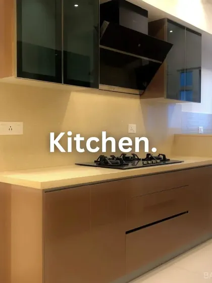 We cook up great kitchen designs. This one features glossy brown cabinets and smoked glass uppers for a sleek and modern feel.