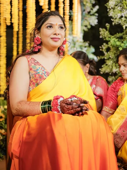A portrait of the bride during her Haldi ceremony, looking serene and beautiful.