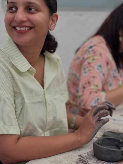 A happy participant takes a moment to smile during our rainy Sunday workshop. The vibe is always relaxed, fun, and all about enjoying the process.