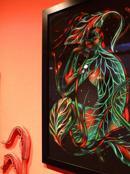 Another angle of my award-winning thesis work on display, showing the interplay between the two framed pieces and the smaller sculptural elements.