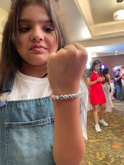 At this mermaid-themed party, the girls loved making their own personalized bracelets. It's a wonderful, calm activity that lets them create a beautiful keepsake.