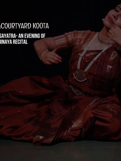 A stunning shot from 'Rasayatra', an evening of Abhinaya recital. The dancer's expressive pose and traditional costume are beautifully captured, showcasing the emotive power of Bharatanatyam.