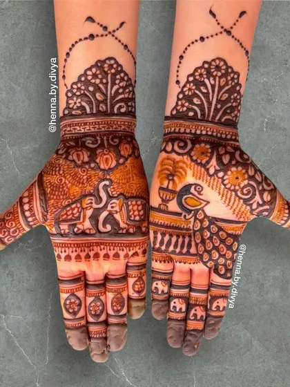 A unique design with a tree-of-life motif on the wrist. The palms feature a peacock and an elephant, symbolizing nature and royalty.