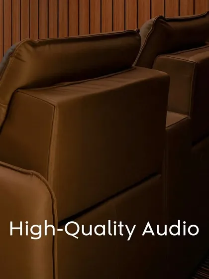 Every detail matters in a custom home theater. This series of shots highlights the clean lines of the ceiling lighting, the texture of the wood-paneled acoustic walls, and the high-quality finish of the leather recliner seats, all contributing to a premium experience.