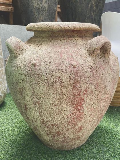 A larger version of the 'Krio' planter, showcasing its beautiful, weathered texture.