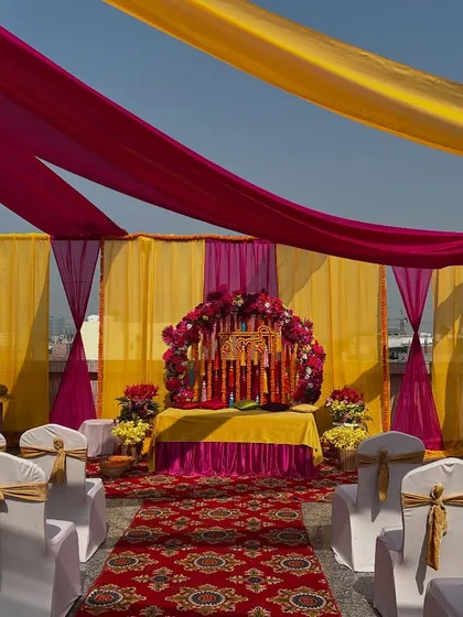 A stage area set up on a terrace, showing how we can create a dedicated ceremony space even in an open-air venue.