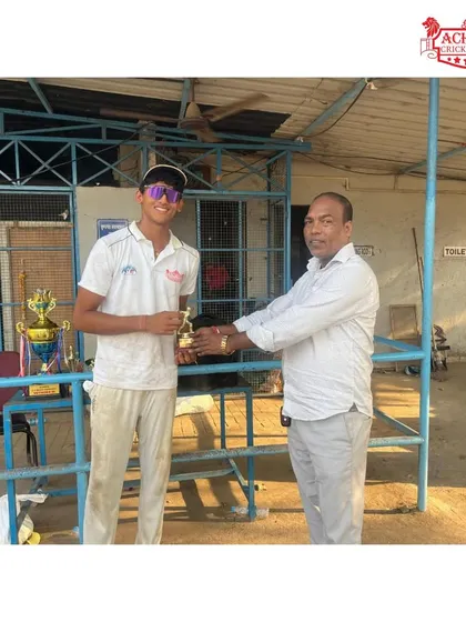 Mittansh N receiving his 'Best Batsman' and 'Man of the Series' awards at the AT Cup.