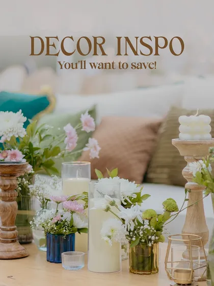 A close-up of tabletop decor, showing a mix of candles and fresh flowers. I believe that luxury is in the details, and I ensure every centerpiece is thoughtfully curated.
