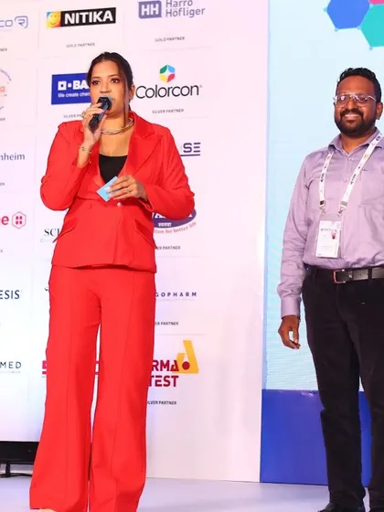 On stage with a guest at the FDD Conclave and Awards Ceremony. I ensure speakers and awardees feel comfortable and celebrated.
