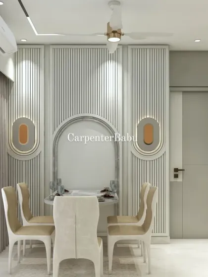 A compact dining area with a round table, set against a wall of vertical fluting and modern sconces. This design is perfect for creating an intimate and stylish dining nook.