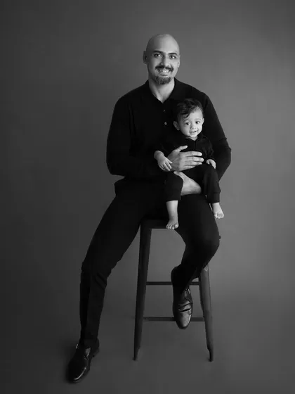 A strong and simple father and son portrait. Black and white photography adds a touch of elegance and emotion to family pictures.