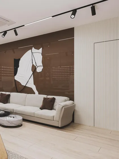 The lounge area of the office features a large, graphic horse artwork, creating a bold and powerful statement.