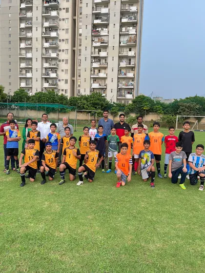 Another shot of the players and coaches from both academies after the U-11 match. We believe in fostering a healthy, competitive community.