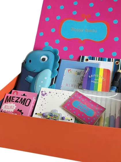 My Huggable Hatchlings boxed Rakhi gift set for the little champs. It's filled with useful gifts, a cute rakhi, and yummy candies.