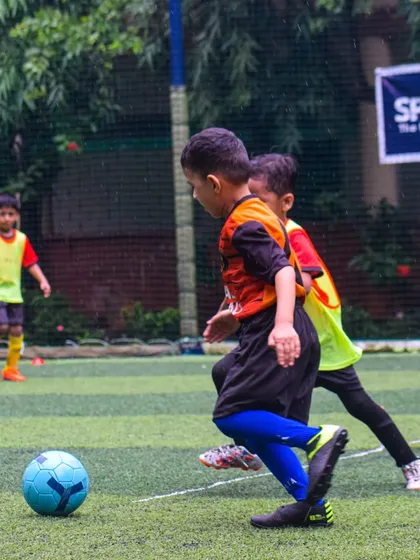 A young player from our U6 team dribbling the ball during the Monsoon Cup.