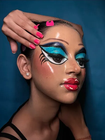 The complete look, showing how the makeup transforms the face into a living piece of art.