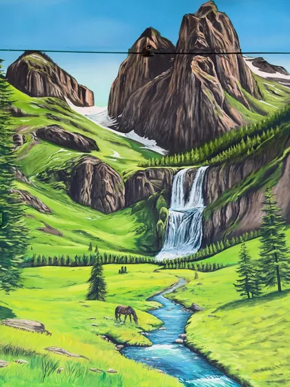 The finished mountain landscape mural, seen here without any obstructions. The goal was to create a piece of art that you can get lost in, offering a view of a world beyond the room.