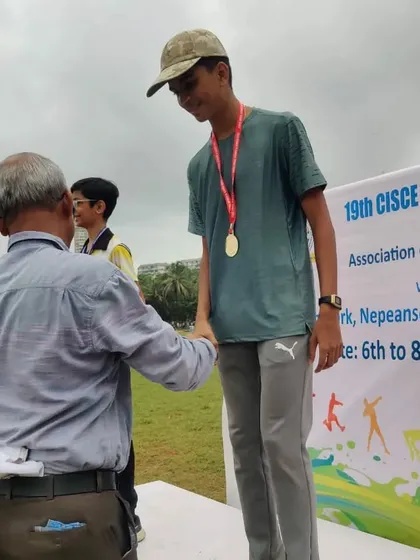 Deep Pilankar receiving his Gold medal for the 3000m run at the ICSE/ISC Zonal Athletics Meet.