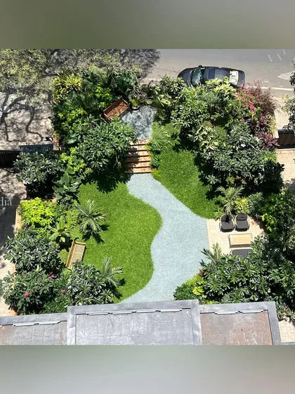 Another aerial perspective of the South Mumbai entrance garden, showing how the design provides green views for the surrounding apartments and creates a park-like feel in a dense urban area.