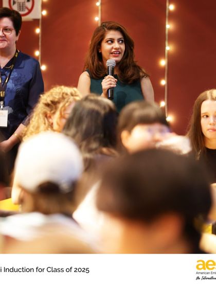 An alumna shares her journey and advice with the graduating class during their induction. These stories provide real-world insight and inspiration as our seniors prepare for life after high school.