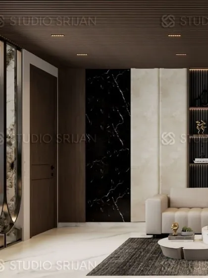 A detail shot of the lobby, highlighting the contrast between a black marble accent wall and lighter, textured panels.