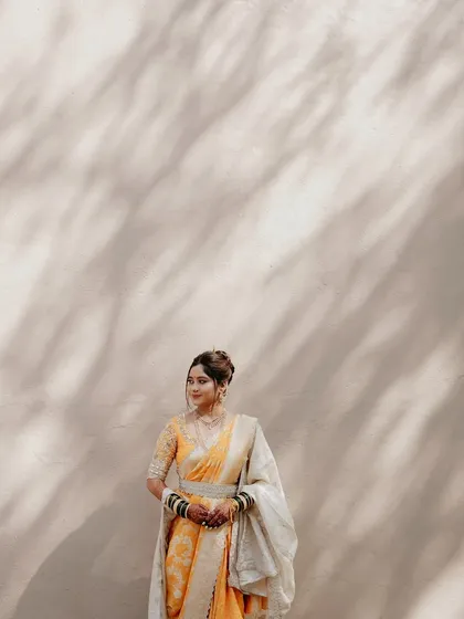Another angle of this stunning bride, showing how the complete look comes together with poise and elegance.