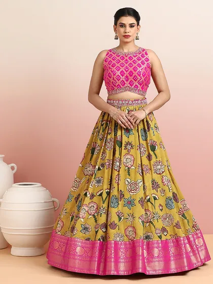 Another look at the mustard and pink floral lehenga, a consistent favorite for its vibrant and joyful aesthetic.