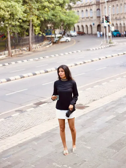 The 'Femme Fatale' concept. This shot, taken on the streets of Mumbai, establishes a chic, elegant, and powerful character. It's the kind of storytelling that can define a brand's entire aesthetic.