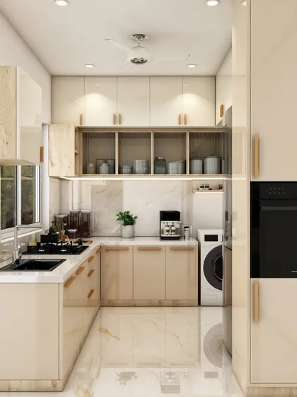 The full L-shaped layout is visible here, showcasing the ample storage and countertop space, along with a built-in oven for a modern touch.
