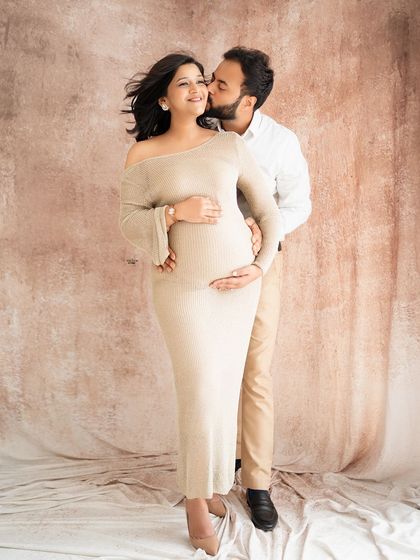 A sweet kiss for the mamma-to-be. This is a beautiful shot from a returning client, and it's so special to capture their growing family.