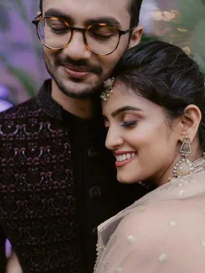 An intimate moment with her partner. The makeup looks soft and beautiful even in close-up, candid shots.