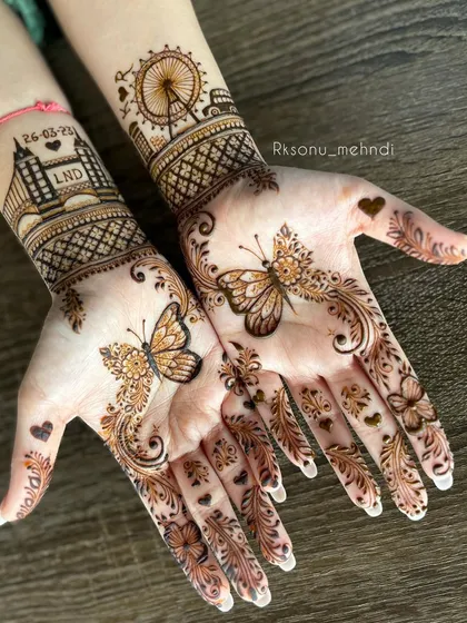For a bride's special day, we created this bespoke engagement mehndi design that tells her unique love story. It features the London skyline where she met her partner, their wedding date, and delicate butterflies, blending modern romance with elegant henna artistry.