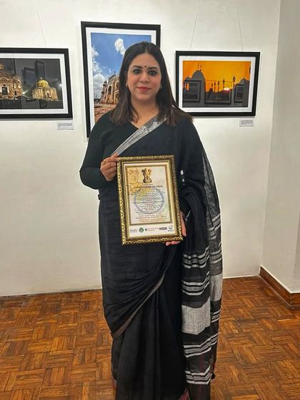 Holding my 'Yuva Ratan Samman' award. It serves as a reminder of my responsibility to guide and inspire the next generation, just as Swami Vivekanand did.
