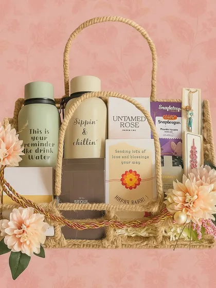 A beautiful Rakhi basket for the best Bhaiya and Bhabhi. It includes matching "Sippin' & Chillin'" bottles, Zara perfumes, a reed diffuser, cookies, and a lovely couple rakhi set.