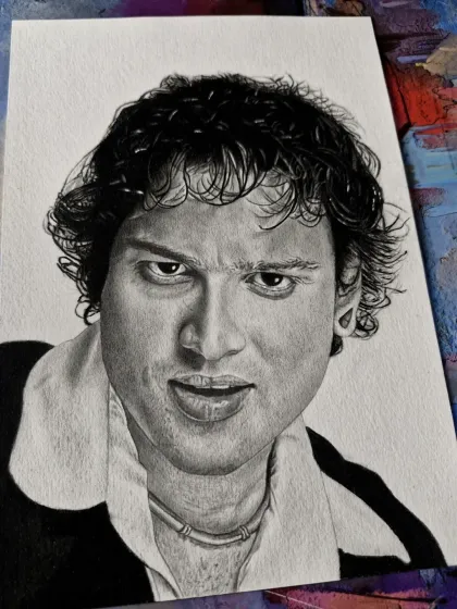 A tribute portrait of the popular singer Zubeen Garg, capturing his intense gaze.
