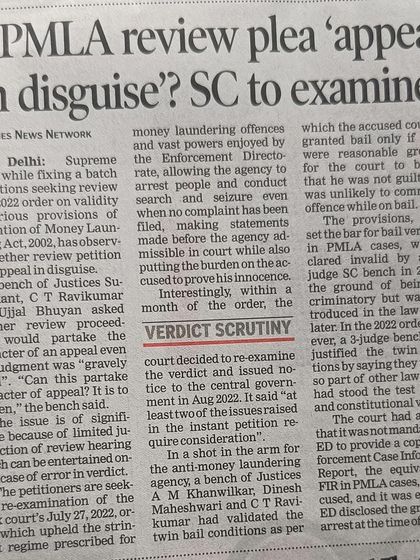 A newspaper article on the Supreme Court's decision to examine a review plea concerning the PMLA verdict, a crucial development for cases involving money laundering defense.