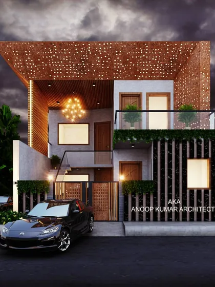 This modern facade features a perforated wooden screen that acts as a decorative element and a light filter. The dramatic night lighting emphasizes the pattern and the warm tones of the wood.