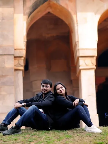Using the iconic arches of Lodhi Garden as a backdrop for a casual pre-wedding photo. This shot shows how we can blend historical architecture with modern, relaxed couple poses.