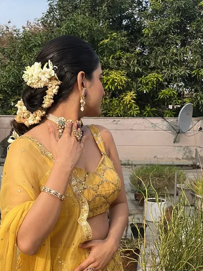 A beautiful gajra braid that transitions into a low bun. This is a classic South Indian bridal hairstyle that is both traditional and stunning.