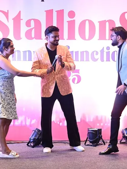 A fun moment of on-stage interaction with guests. I thrive on spontaneous, unscripted moments that make each corporate event unique and memorable for the audience.