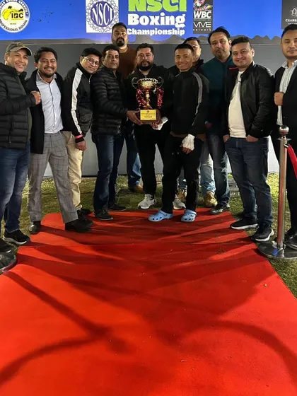 The red carpet moment with the team and the trophy. We celebrate our successes and the hard work that goes into them.