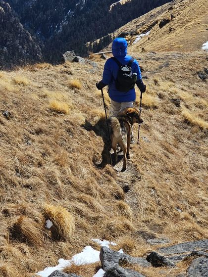 Following my guides on a narrow mountain path. Even when you're trekking solo, you're never truly alone in the mountains. The connections you make along the way are part of the experience.