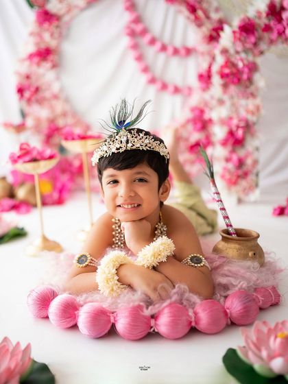 A charming close-up of this little Krishna, with a sweet smile that could melt anyone's heart.