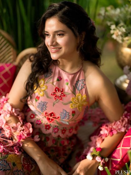 Another gorgeous shot of Yogita's fresh-faced Mehendi look. The natural light highlights her dewy skin, a signature style I love to create for my brides.