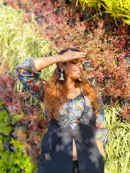 Soaking up the sun in Udaipur. This look combines a colorful printed top with statement silver jhumkas, blending my love for fashion and travel.