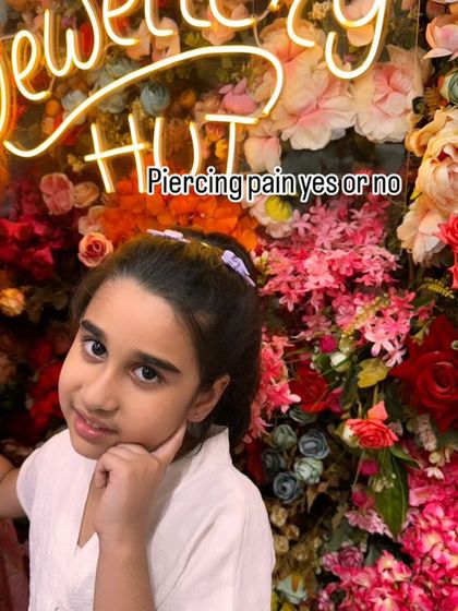 This young client is all smiles after her piercing. We ensure the experience is so smooth that they forget to even feel the pain.