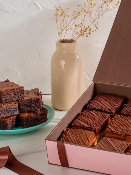 My Assorted Bars Gift Box is perfect for those who love variety. It features a mix of my fudgy brownies and rich millionaire shortbread bars.