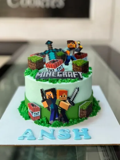 A detailed Minecraft cake showing characters and elements from the game. This is a duplicate view of image 4.